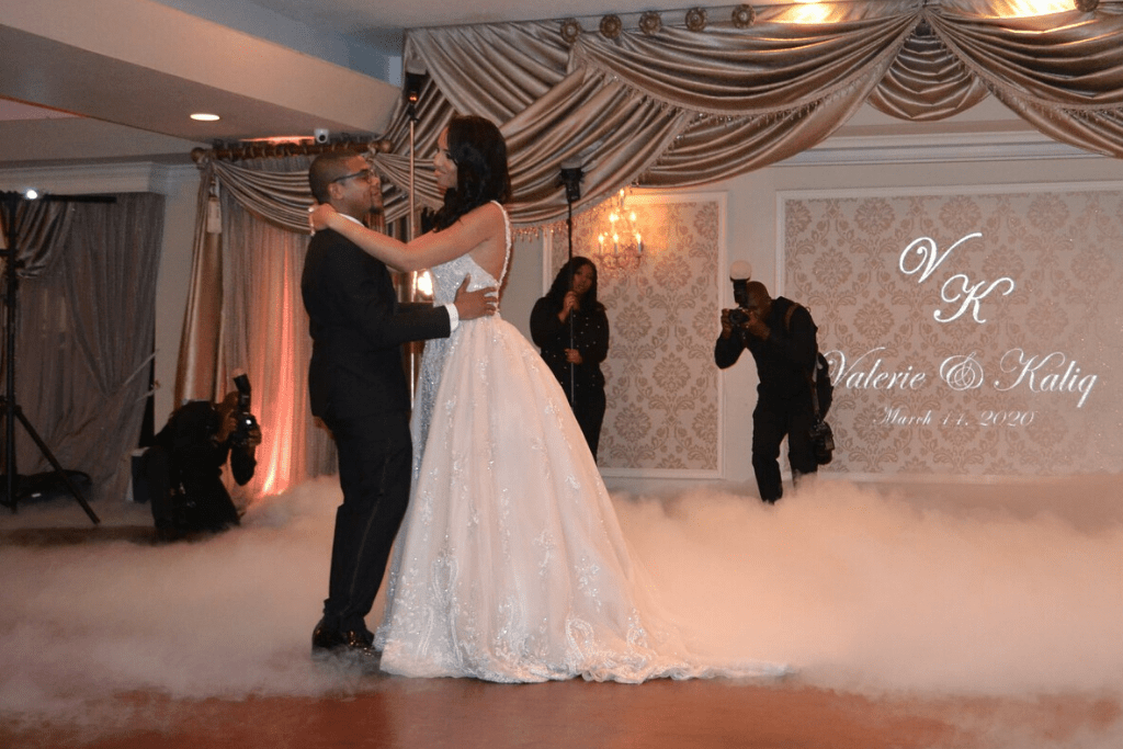A bride and groom dancing at their wedding reception