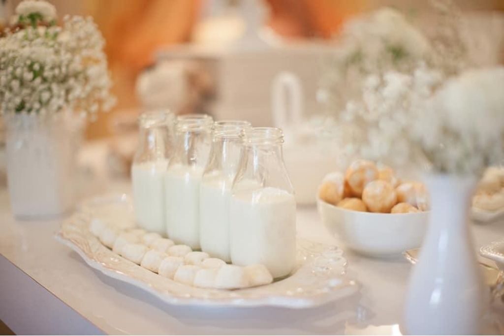 Milk and desserts at a baby shower