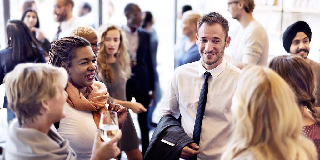 A group of corporate employees at a company partyfinding the right corporate event venue